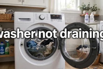 A front-load washing machine with its door open showing clothes sitting in water, with the text washer not draining displayed across the image